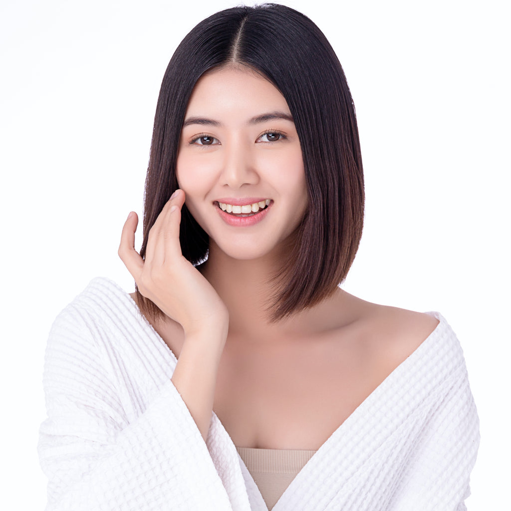 Asian woman with healthy skin wearing natural makeup