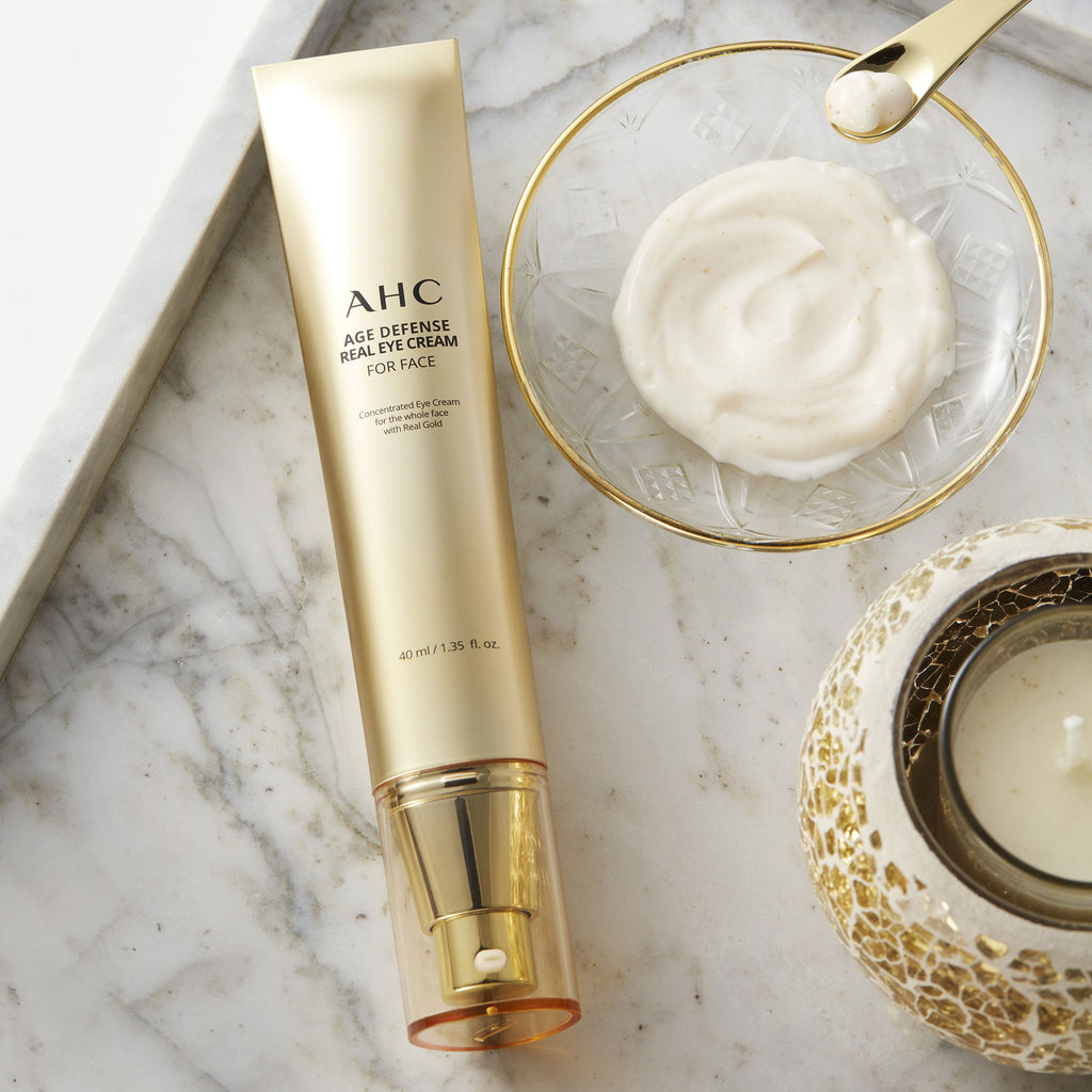 AHC Age Defense Real Eye Cream For Face on a marble table